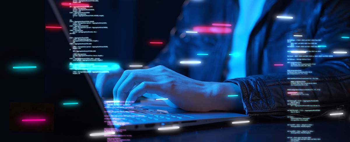 Person typing on a laptop with digital code and data overlays, representing cybersecurity, software development, and advanced computing.