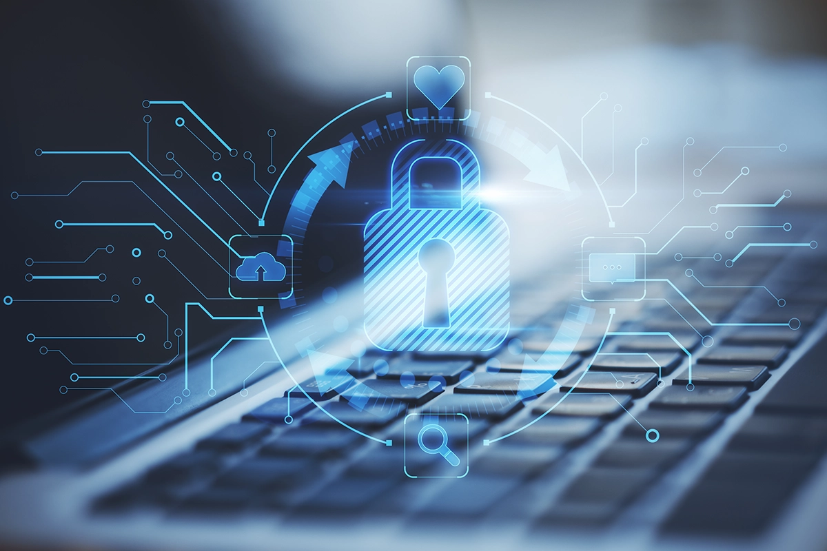 Digital lock icon over laptop keyboard representing cybersecurity, data protection, and secure networks